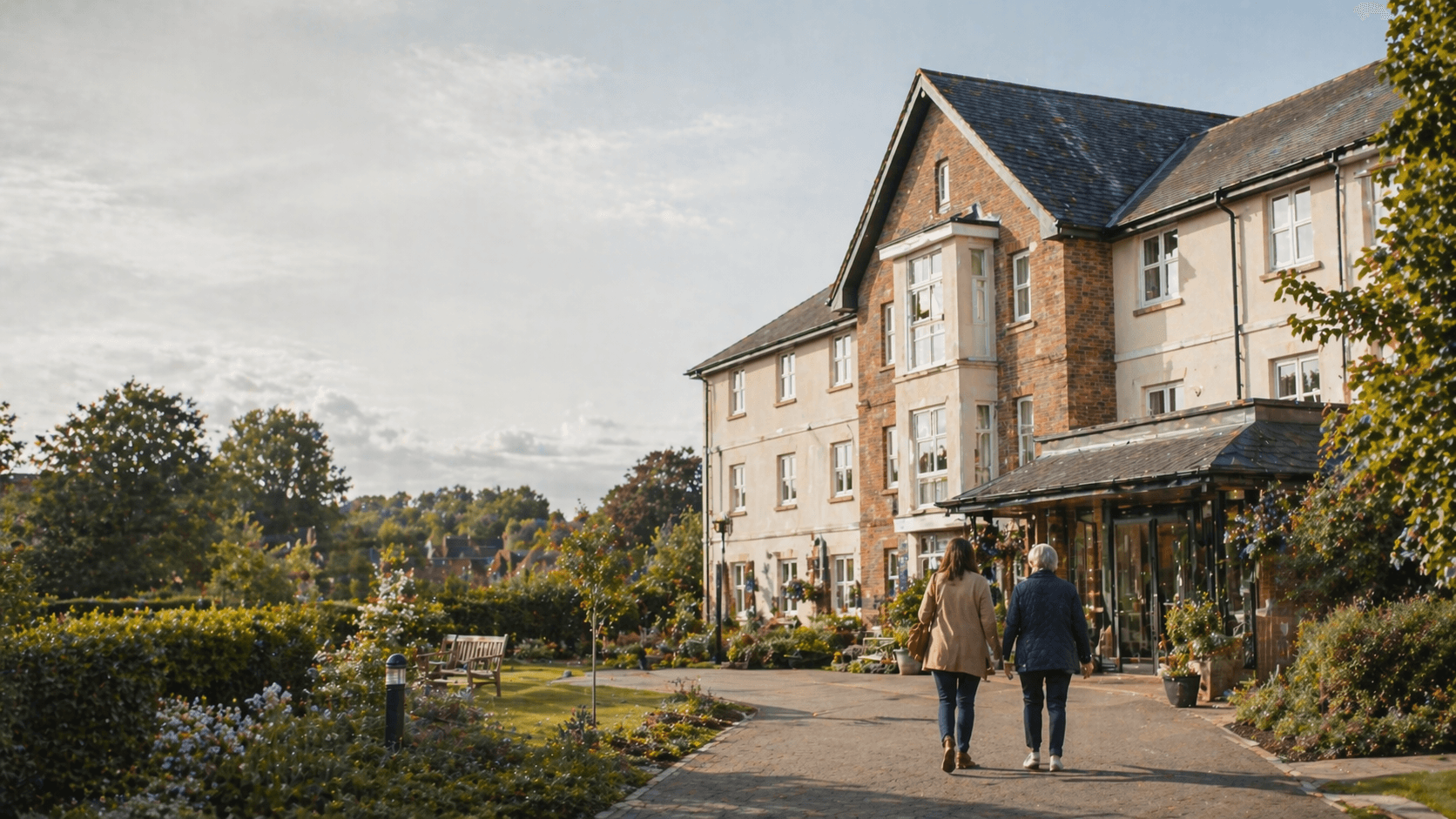 British care home exterior with family arriving
